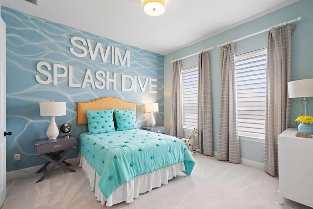 bedroom featuring carpet floors and baseboards