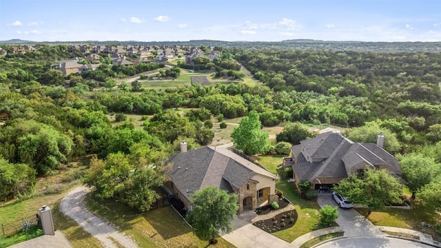 birds eye view of property with a residential view