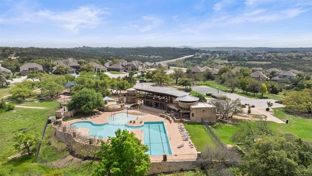 birds eye view of property with a residential view