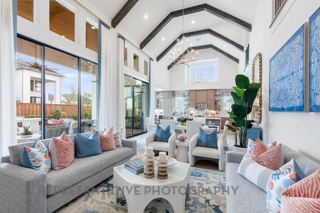 living area featuring recessed lighting, a chandelier, high vaulted ceiling, and beamed ceiling