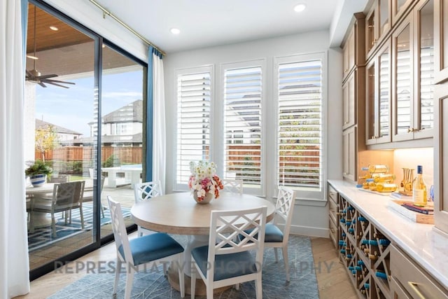 dining area with ceiling fan, recessed lighting, and light wood-style flooring