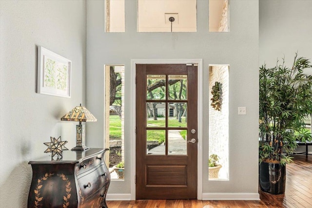 10601 Spicewood Pkwy, Austin, TX 78750 - foyer entrance featuring wood finished floors and baseboards