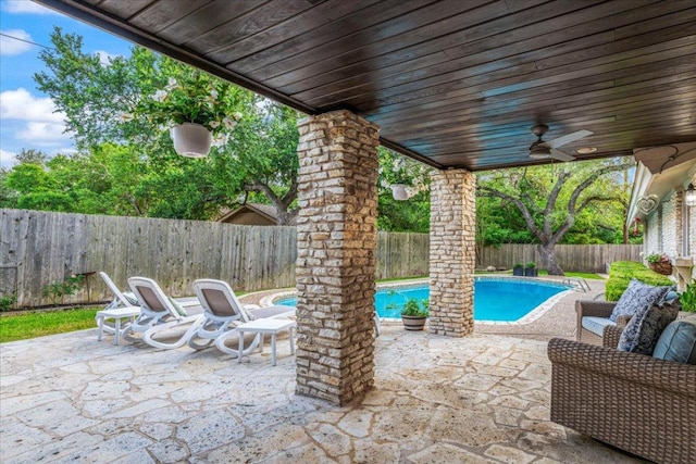 10601 Spicewood Pkwy, Austin, TX 78750 - fenced backyard featuring a patio and ceiling fan