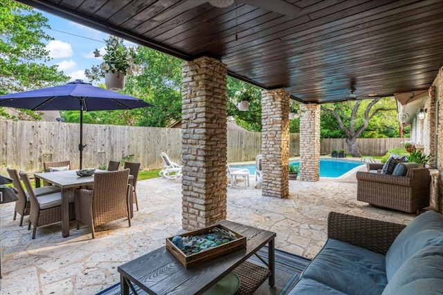 10601 Spicewood Pkwy, Austin, TX 78750 - fenced backyard featuring outdoor dining area and a patio