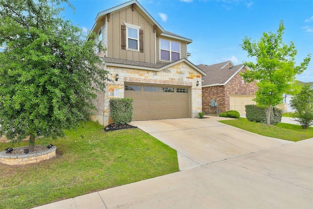 view of front facade with a front lawn, stone siding, a garage, board and batten siding, and concrete driveway