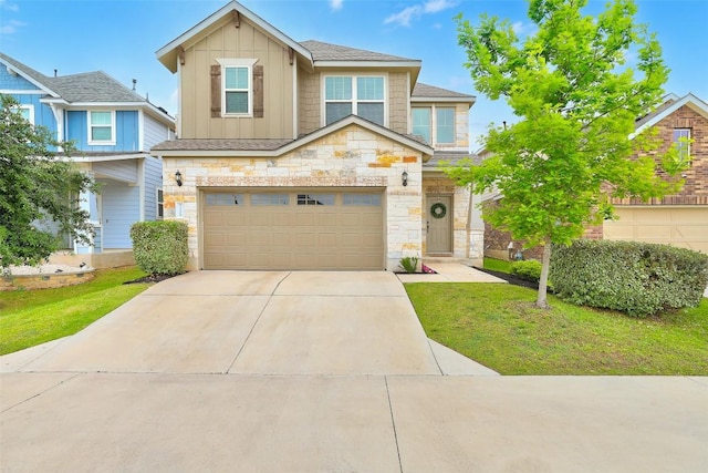 view of front of property featuring a garage, board and batten siding, driveway, and stone siding