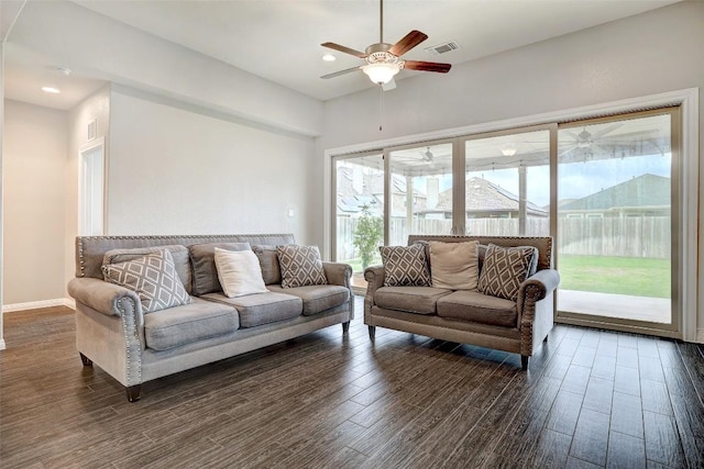 living room with dark wood-style flooring, ceiling fan, recessed lighting, baseboards, and visible vents