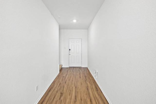 182 Geode Gln, Maxwell, TX 78656 - corridor with wood finished floors and baseboards