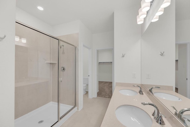 201 Lucky Texan Rd, Jarrell, TX 76537 - full bath with a stall shower, a spacious closet, and double vanity