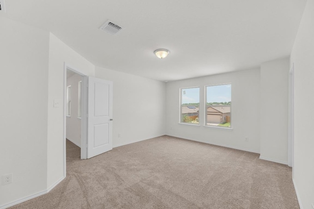 201 Lucky Texan Rd, Jarrell, TX 76537 - carpeted spare room featuring baseboards