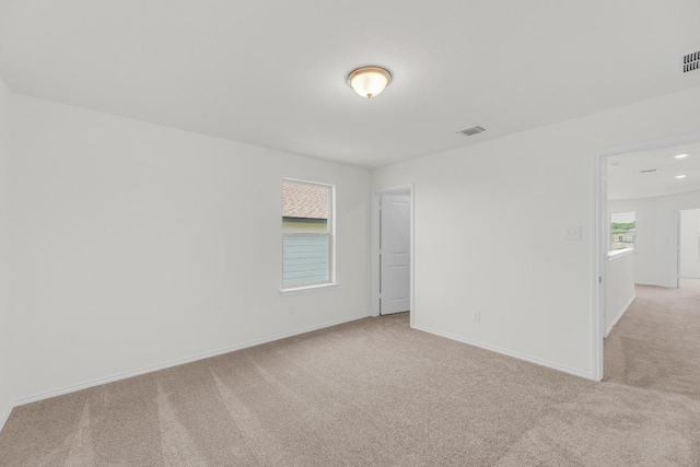 201 Lucky Texan Rd, Jarrell, TX 76537 - empty room with light colored carpet and baseboards