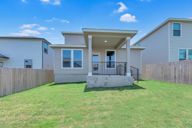 201 Lucky Texan Rd, Jarrell, TX 76537 - rear view of house with a fenced backyard