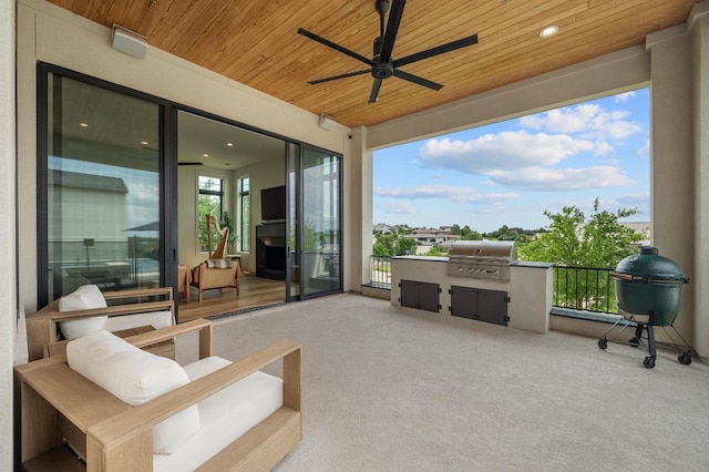 view of patio / terrace with a ceiling fan and grilling area
