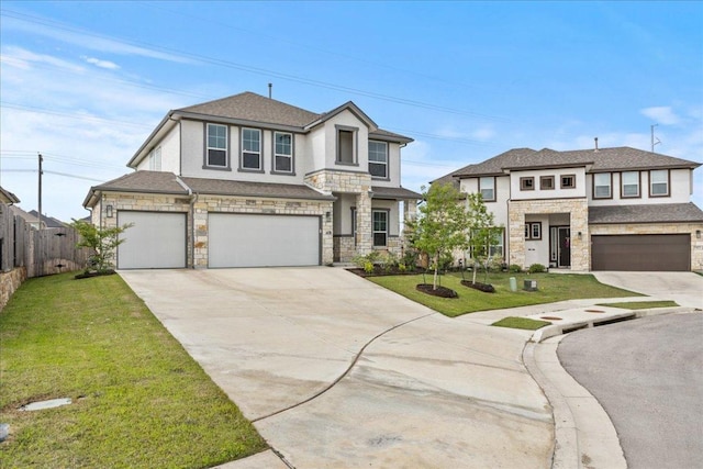 476 Wild Pecan Loop, Buda, TX 78610 - view of front of property with stone siding, an attached garage, concrete driveway, and stucco siding