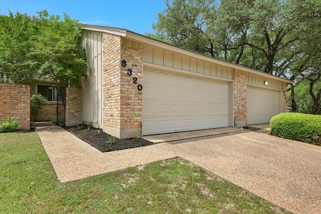 garage with driveway