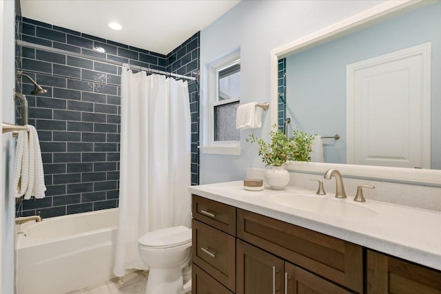 full bathroom with toilet, shower / bathtub combination with curtain, and vanity