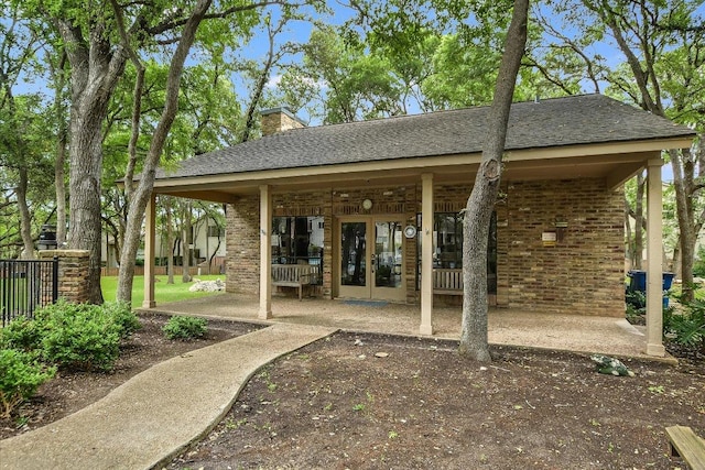 surrounding community featuring a patio and fence