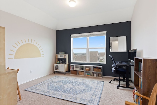 carpeted home office with baseboards