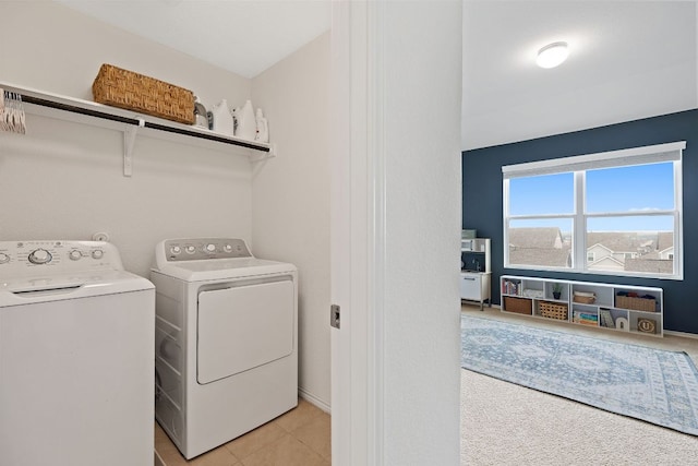 washroom with laundry area and independent washer and dryer