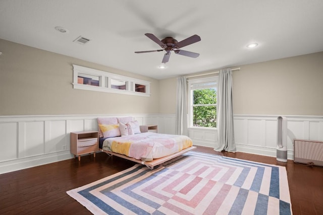 9417 Hopeland Dr, Austin, TX 78749 - bedroom featuring a wainscoted wall, a decorative wall, wood finished floors, recessed lighting, and ceiling fan