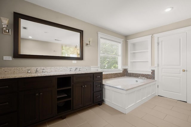 9417 Hopeland Dr, Austin, TX 78749 - full bathroom with a bath, vanity, tile patterned floors, and recessed lighting