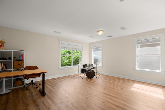9417 Hopeland Dr, Austin, TX 78749 - office area featuring wood finished floors and baseboards