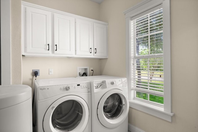 9417 Hopeland Dr, Austin, TX 78749 - laundry area with separate washer and dryer and cabinet space