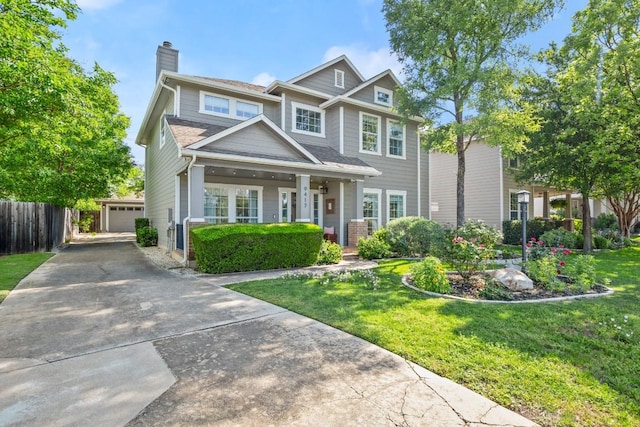 9417 Hopeland Dr, Austin, TX 78749 - view of front facade with covered porch, a chimney, and a garage