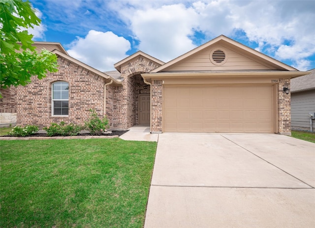 ranch-style home featuring concrete driveway, brick siding, an attached garage, and a front lawn
