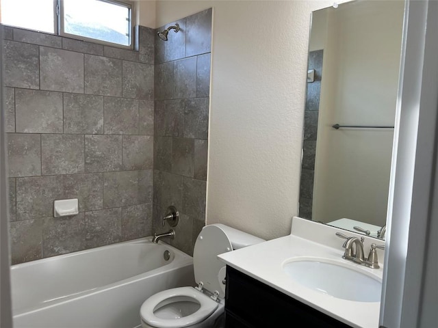 5817 Scenic Lake Dr, Georgetown, TX 78626 - bathroom with toilet, tub / shower combination, vanity, and a textured wall
