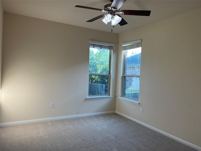 5817 Scenic Lake Dr, Georgetown, TX 78626 - empty room with carpet flooring, baseboards, and ceiling fan