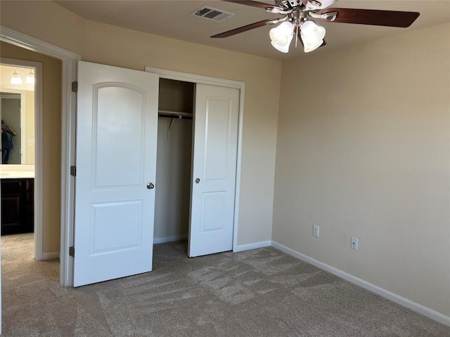 5817 Scenic Lake Dr, Georgetown, TX 78626 - unfurnished bedroom featuring carpet flooring, baseboards, a closet, and ceiling fan
