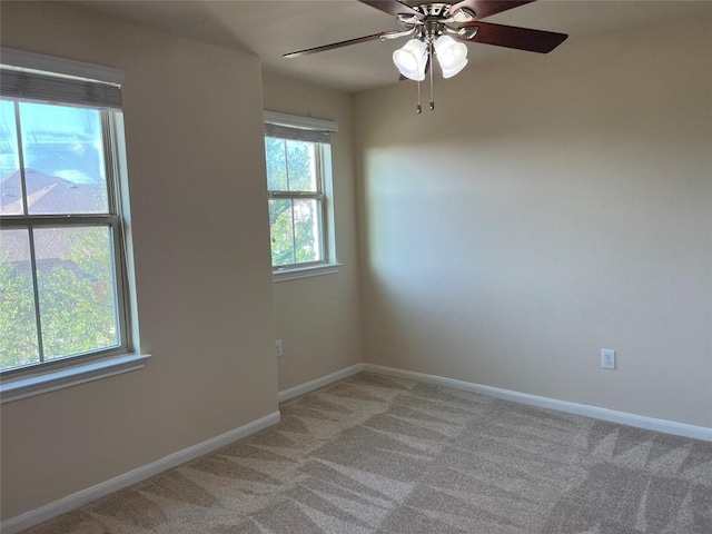 5817 Scenic Lake Dr, Georgetown, TX 78626 - unfurnished room featuring light colored carpet, ceiling fan, and baseboards