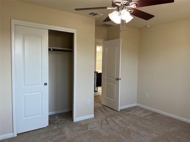 5817 Scenic Lake Dr, Georgetown, TX 78626 - unfurnished bedroom featuring carpet floors, a closet, baseboards, and a ceiling fan