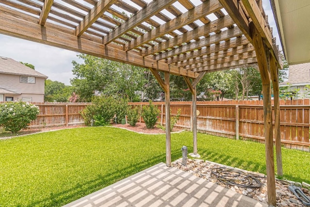 view of yard featuring a fenced backyard, a pergola, and a patio