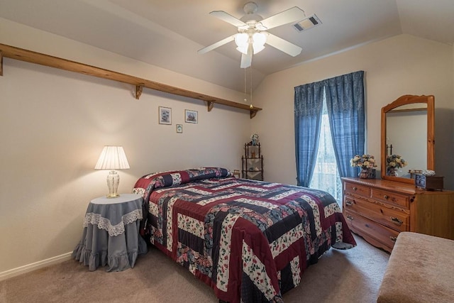 carpeted bedroom featuring visible vents, a ceiling fan, baseboards, and lofted ceiling