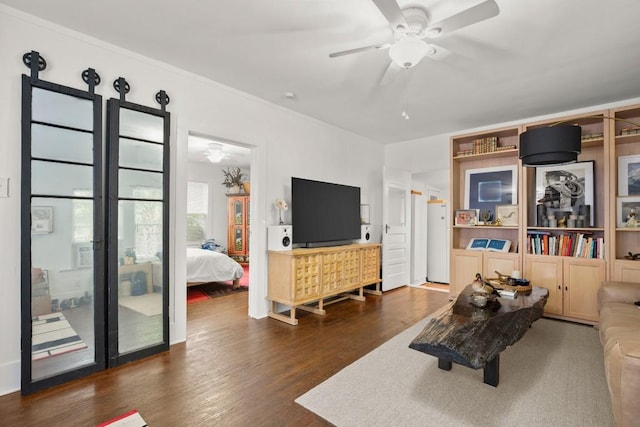 642 Tillery St, Austin, TX 78702 - living room featuring dark wood-style flooring and ceiling fan