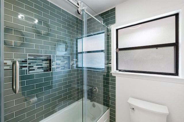 1712 Mccoy Pl, Georgetown, TX 78626 - bathroom with toilet and shower / bath combination with glass door