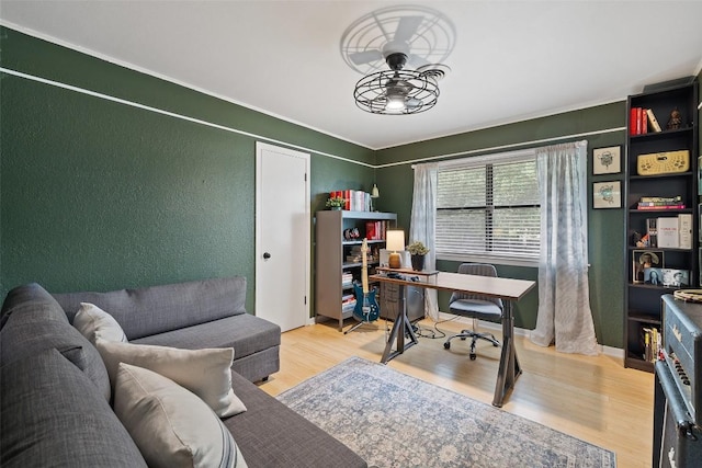 1712 Mccoy Pl, Georgetown, TX 78626 - office space featuring wood finished floors, a ceiling fan, and a textured wall