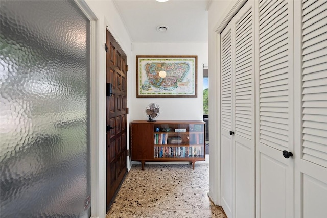 1712 Mccoy Pl, Georgetown, TX 78626 - corridor featuring dark speckled floor