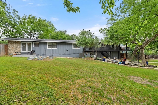 1712 Mccoy Pl, Georgetown, TX 78626 - rear view of house featuring stairway, a deck, a patio area, and stone siding