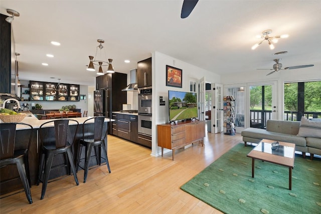 1712 Mccoy Pl, Georgetown, TX 78626 - living area featuring a ceiling fan, light wood finished floors, and recessed lighting