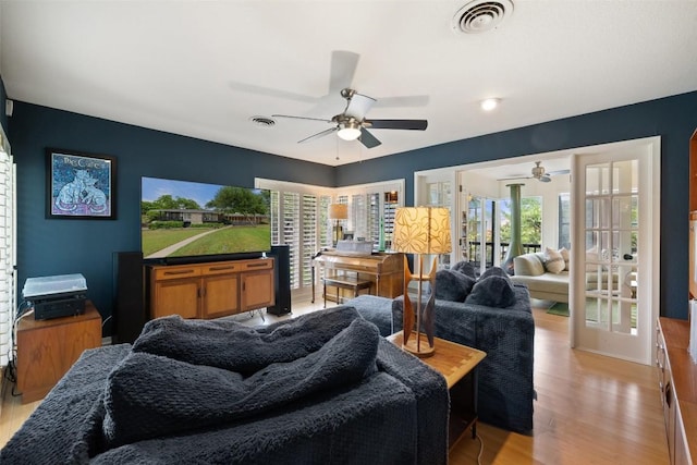 1712 Mccoy Pl, Georgetown, TX 78626 - living room with ceiling fan and light wood-style flooring
