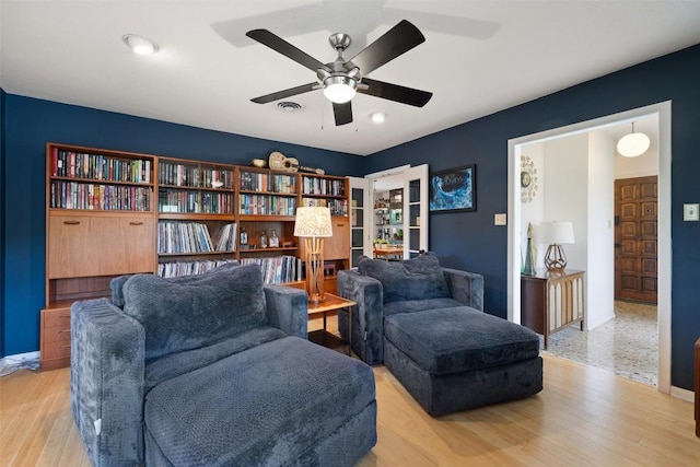 1712 Mccoy Pl, Georgetown, TX 78626 - living area featuring a ceiling fan and light wood-style floors