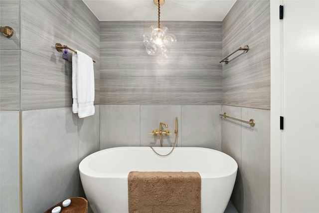 full bath featuring a freestanding bath