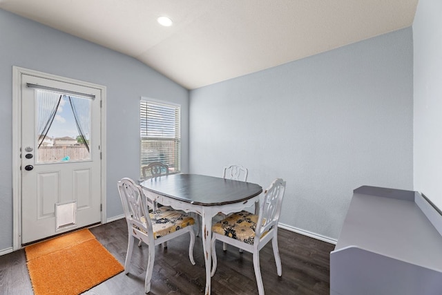 dining room featuring recessed lighting, baseboards, vaulted ceiling, and dark wood-style floors