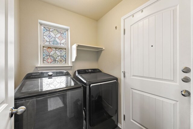 laundry room featuring laundry area and washer and dryer