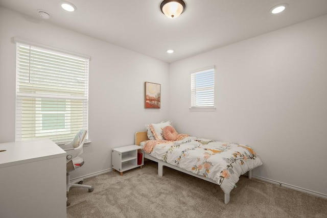 1625 Stinnett Dr, Leander, TX 78641 - bedroom featuring light colored carpet, a desk, and recessed lighting