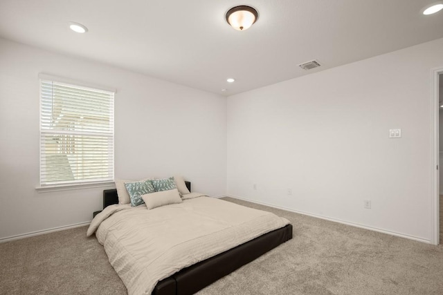 1625 Stinnett Dr, Leander, TX 78641 - bedroom featuring carpet floors, baseboards, recessed lighting, and visible vents