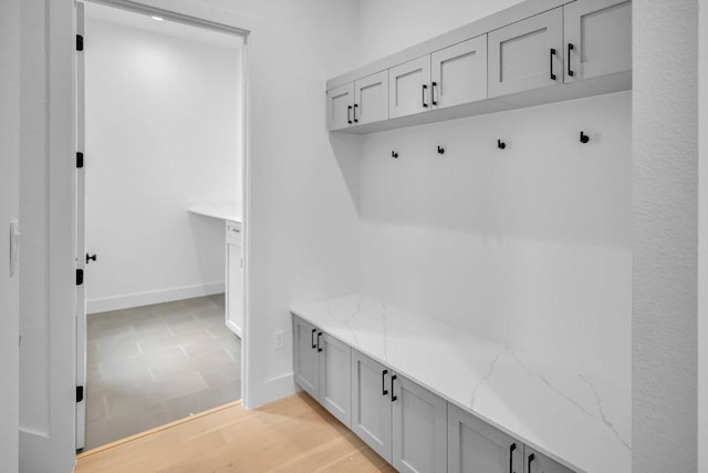 309 Alabaster, Horseshoe Bay, TX 78657 - mudroom featuring baseboards